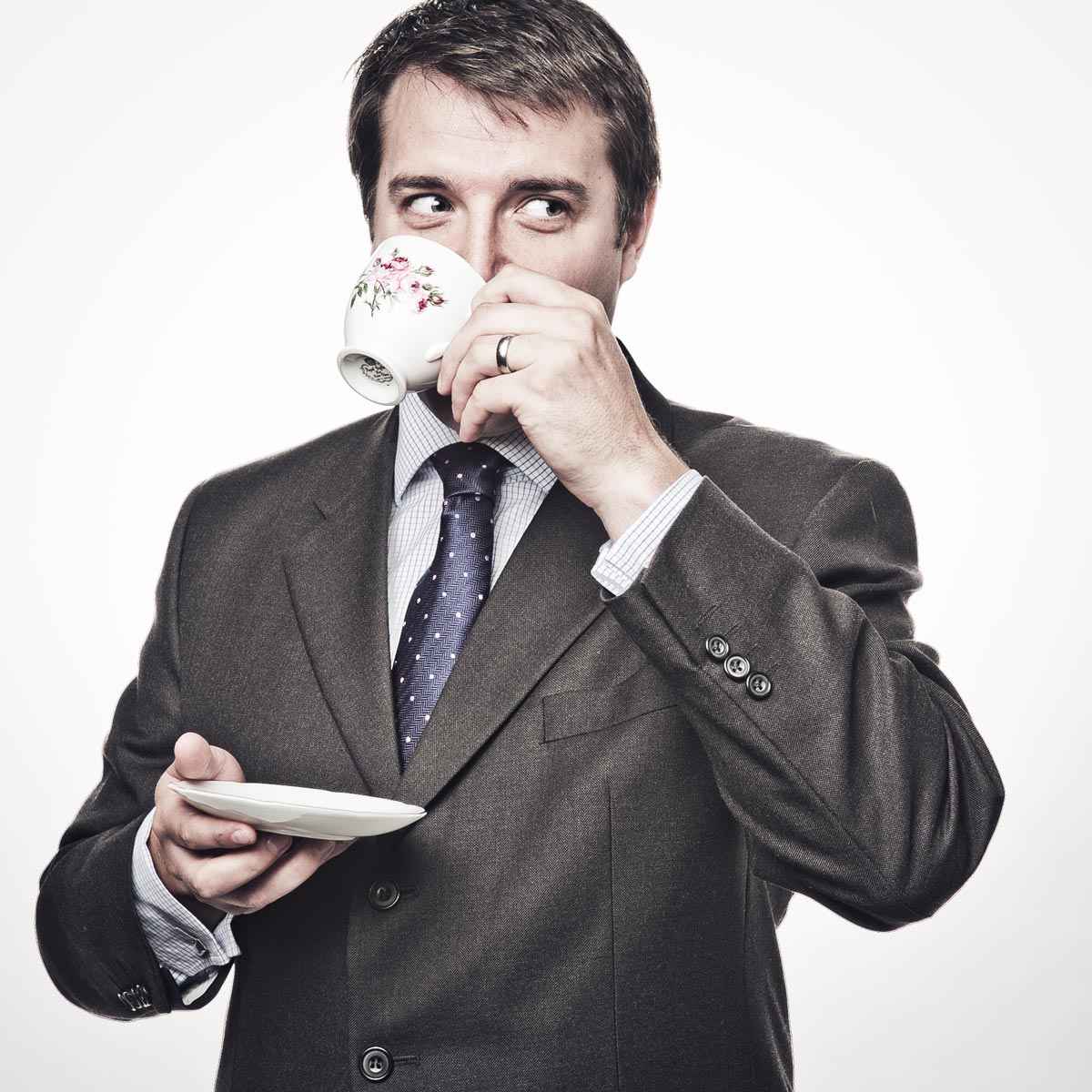 Businessman drinking tea