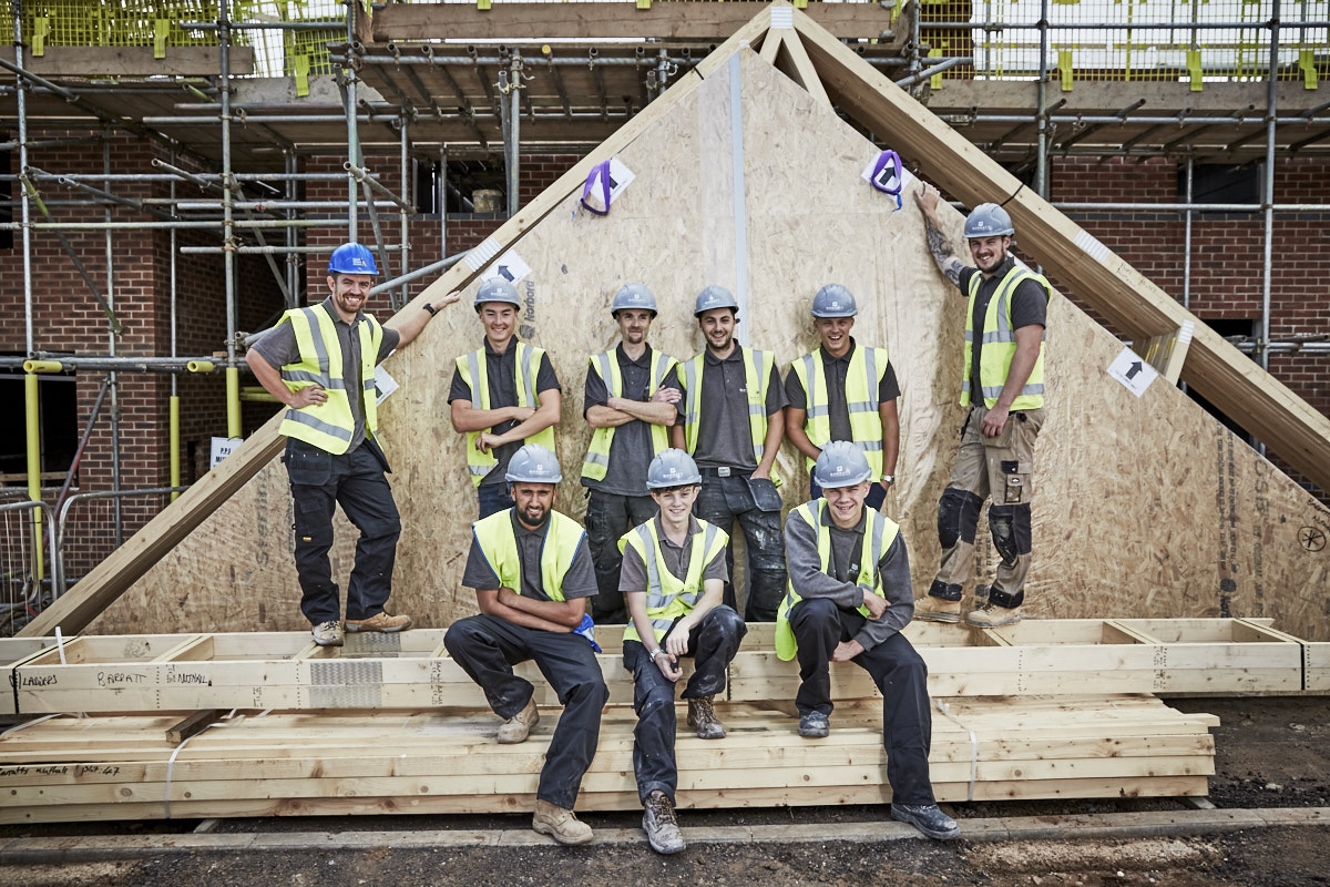 Group of builders on building site