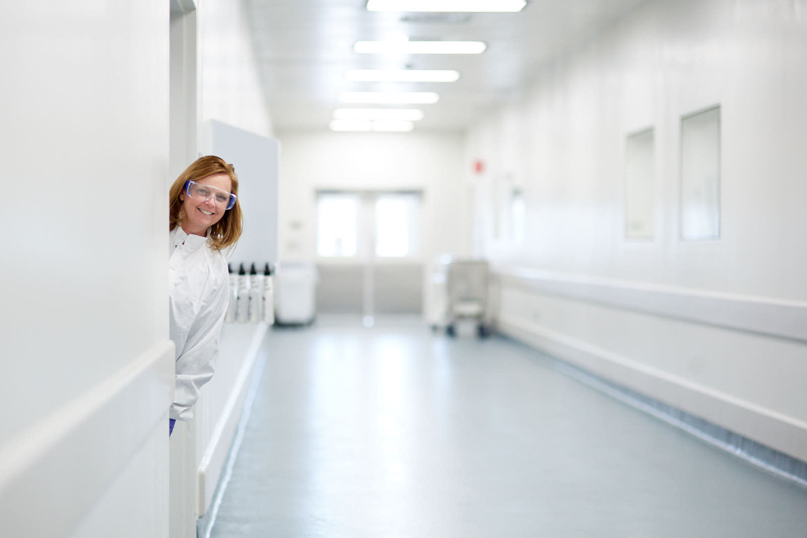 Happy woman in laboratory