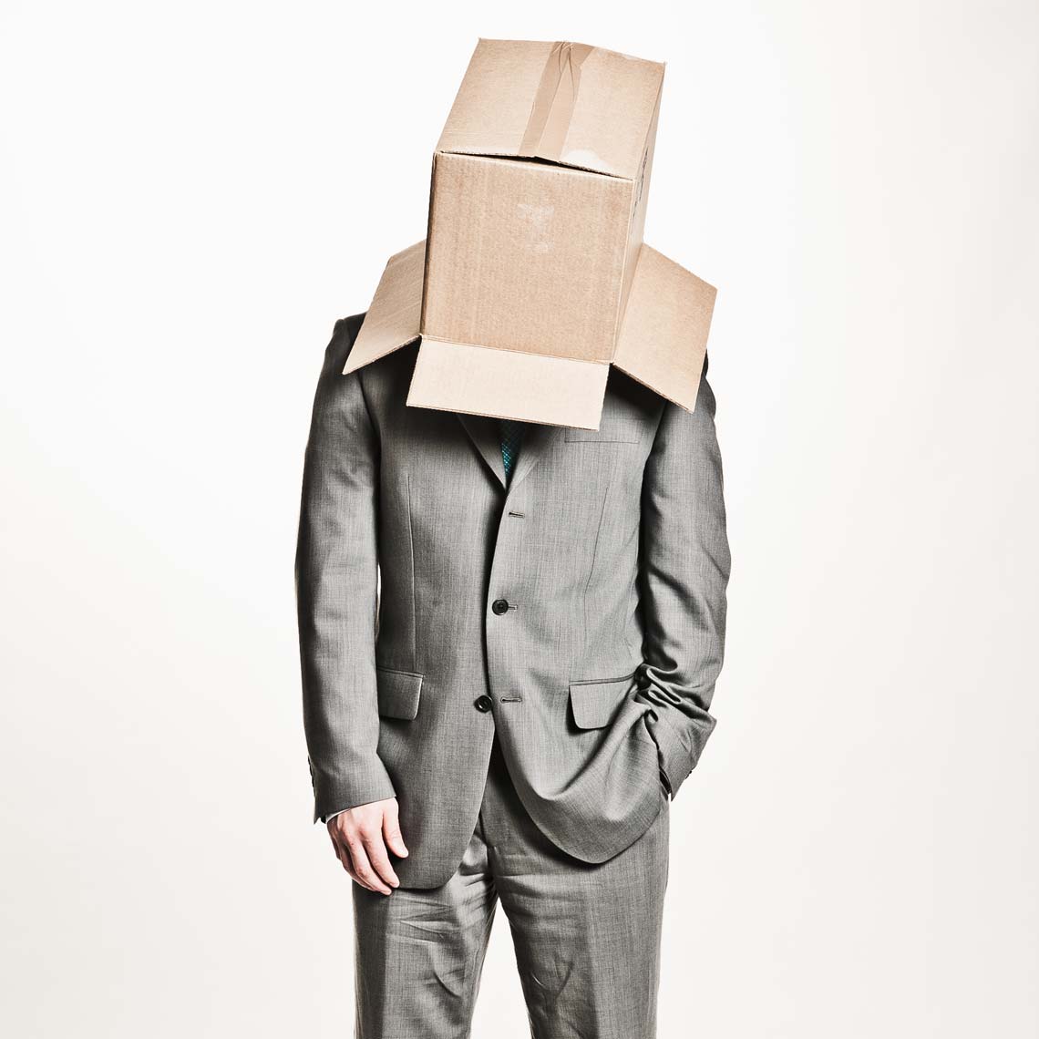 Businessman with box on his head
